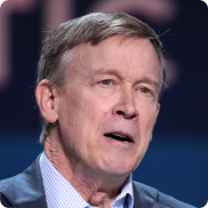 Former Governor John Hickenlooper speaking with attendees at the 2019...